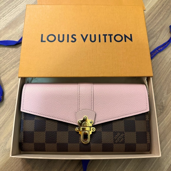 Authentic LOUIS VUITTON
Damier Ebene Clapton Wallet Magnolia - Picture 1 of 7